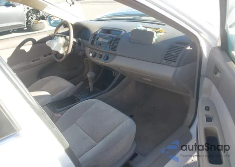 2003 Toyota Camry Le z USA, uszkodzony, nr VIN 4T1BE32K23U123687